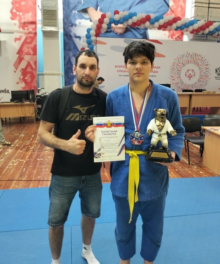 С тренером Ильёй Ониани